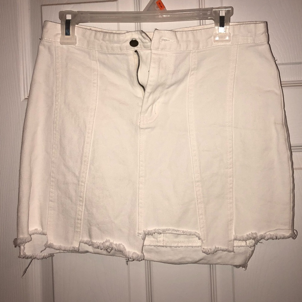 White asymmetrical hem jean skirt